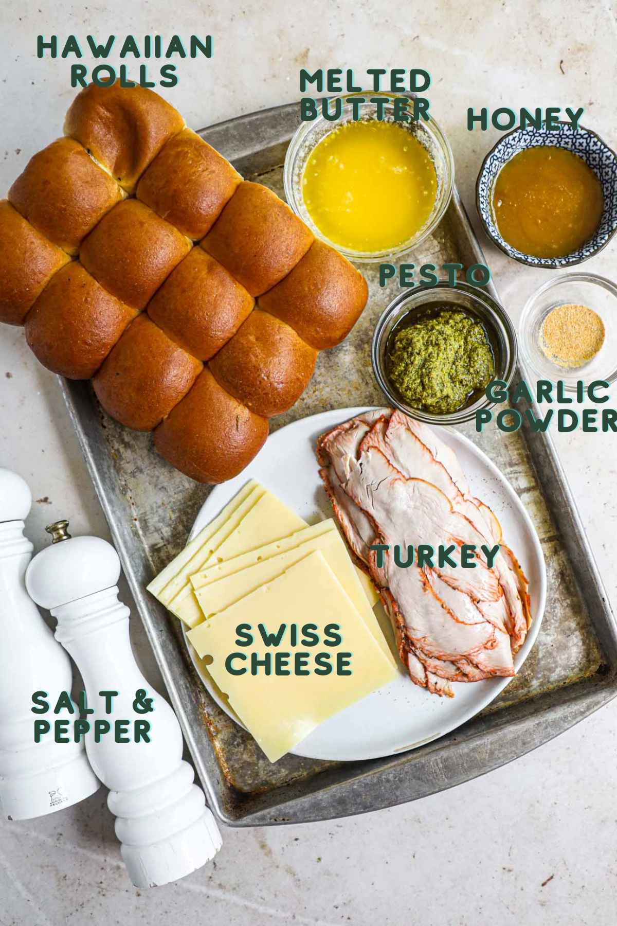 Ingredients to make Hawaiian roll turkey pesto sliders.