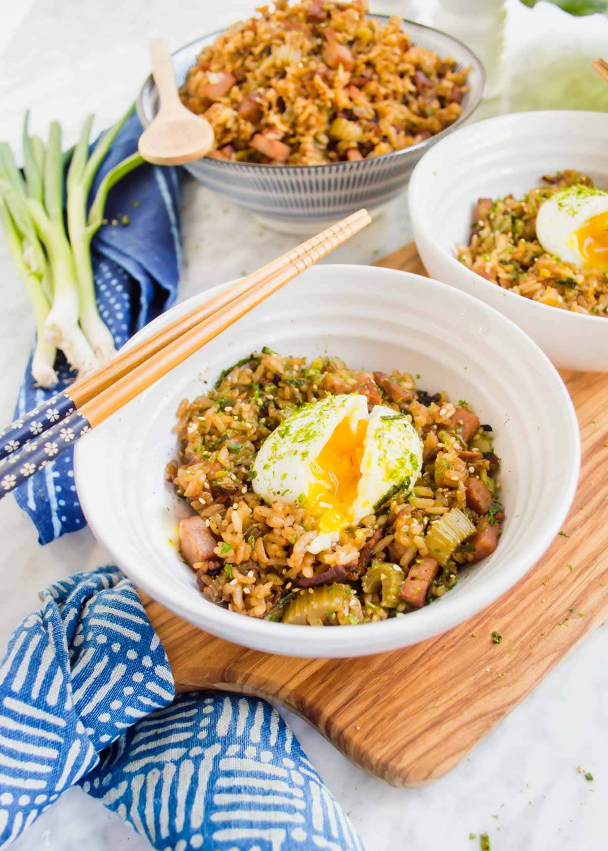 Shoyu Breakfast Fried Rice in bowls with soft boiled egg.