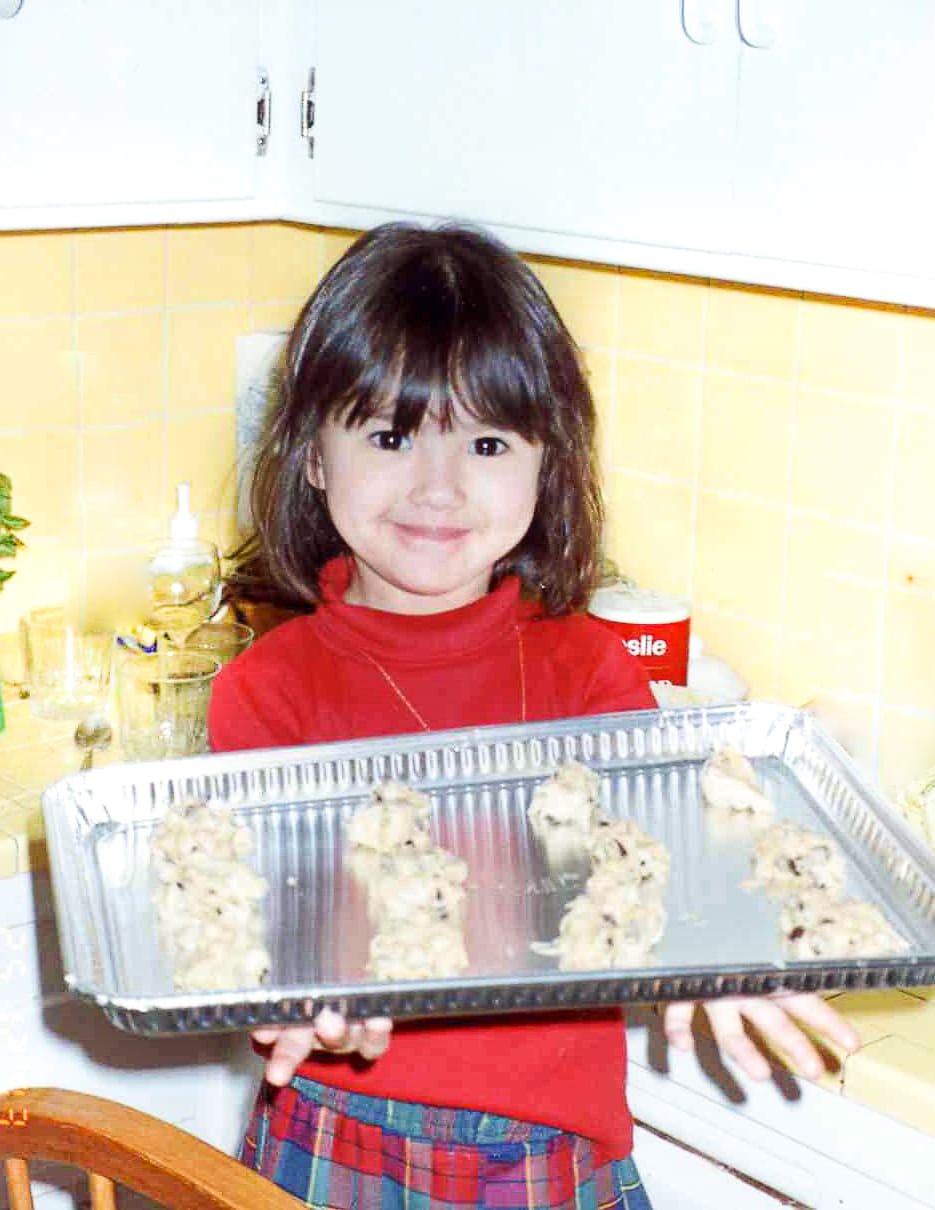 The Heirloom Pantry - Young Kat holding cookie tray