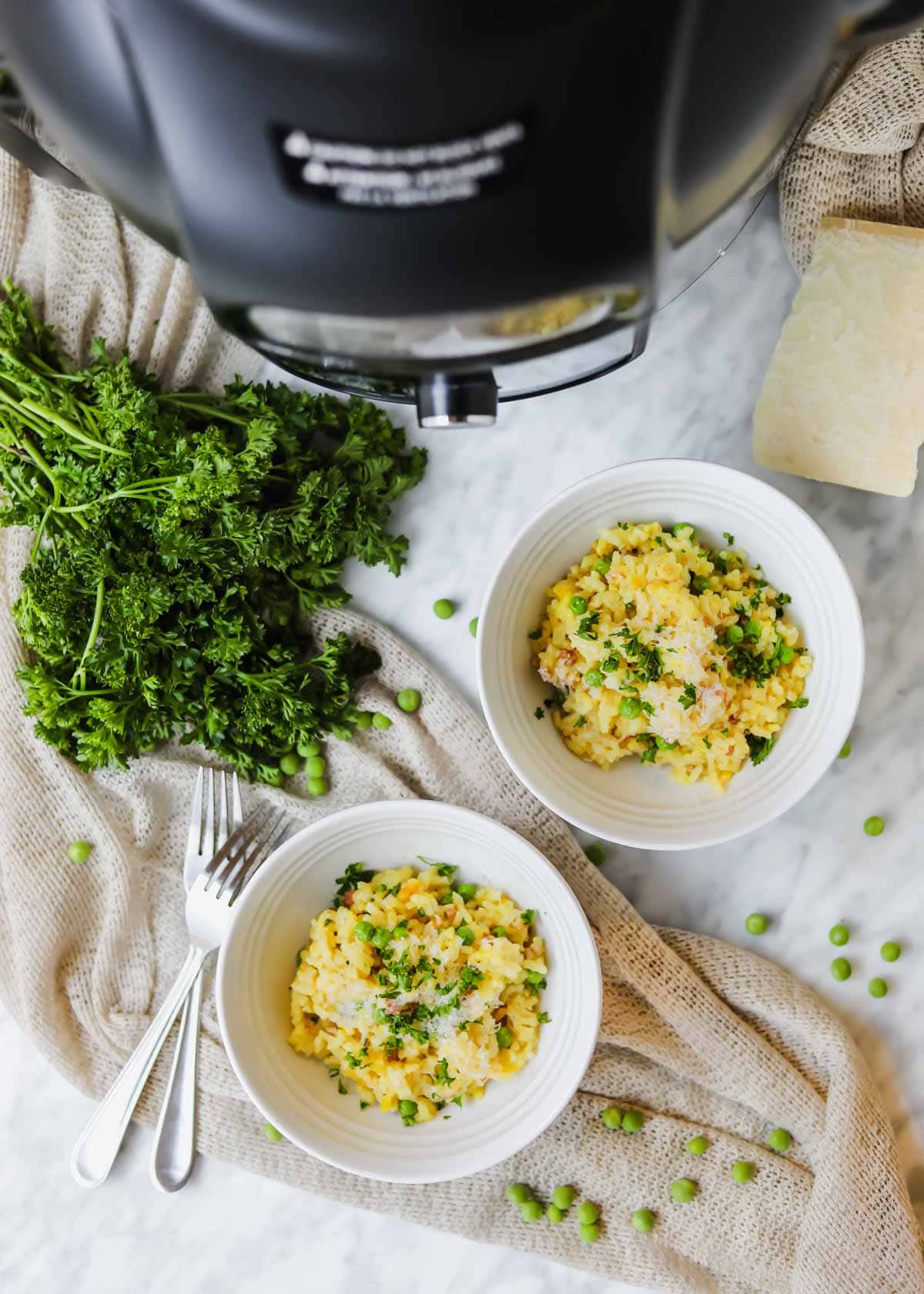 Instant Pot Risotto with Pancetta and Peas in bowls with Ninja Foodi flatlay.
