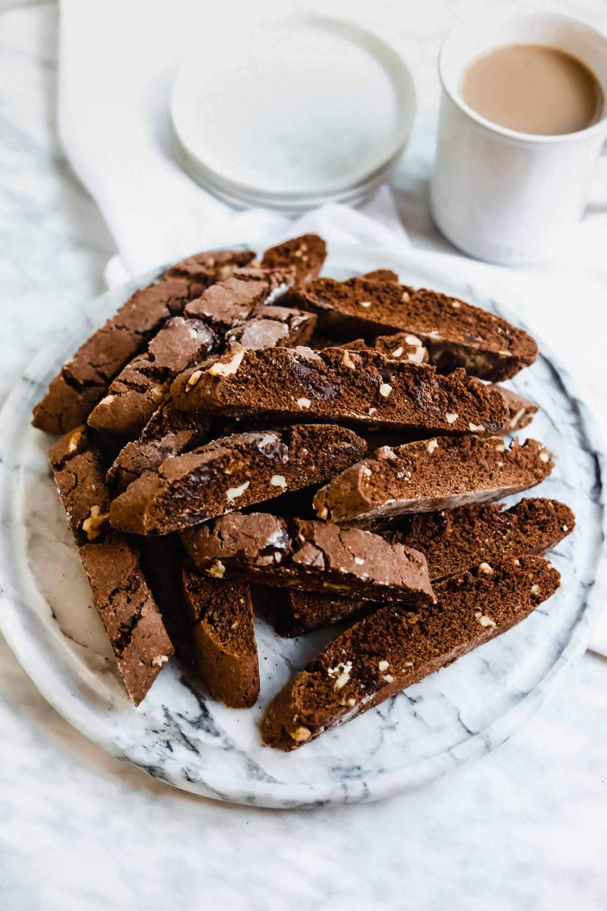 Chocolate and Coffee Biscotti with coffee in background.