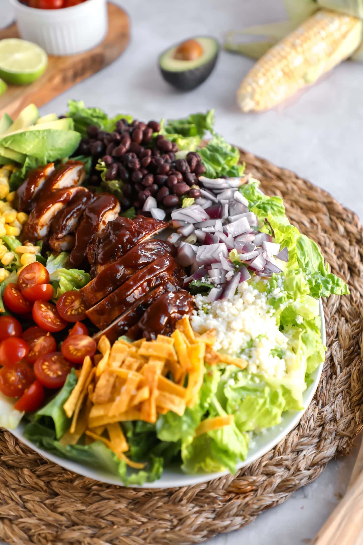 BBQ Chicken Salad with Broiled Chicken and Greek Yogurt Ranch in a white oval platter