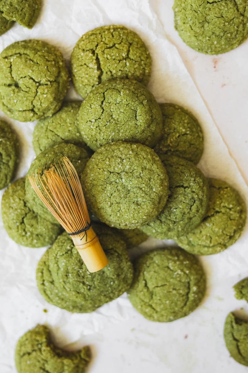 Green tea matcha cookies with a chasen whisk.
