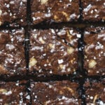 Closeup of browned butter blondie brownies with flaky sea salt.