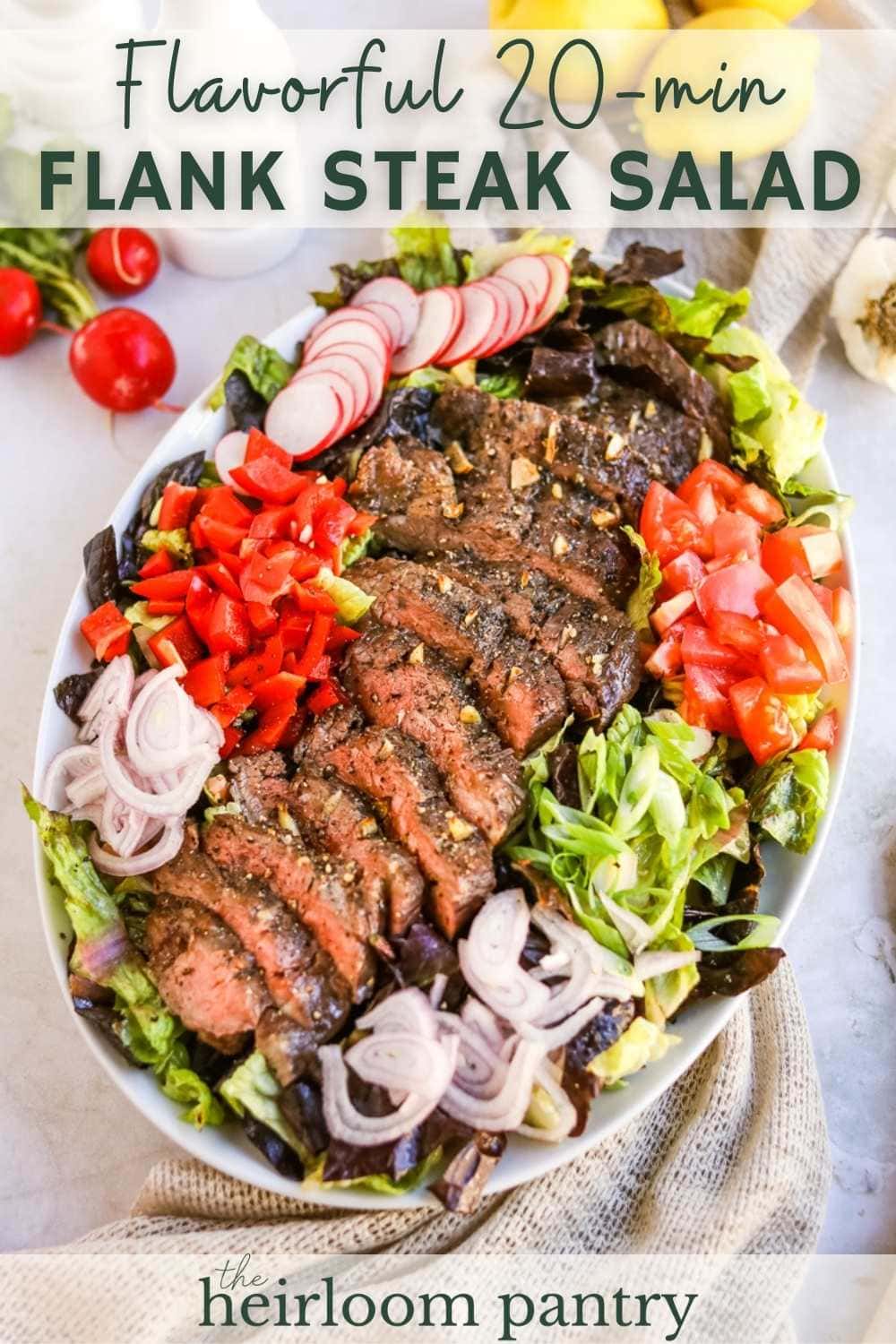 Flank steak salad with lettuce, radish, tomato, bell pepper, shallot, green onion, and a balsamic dressing.