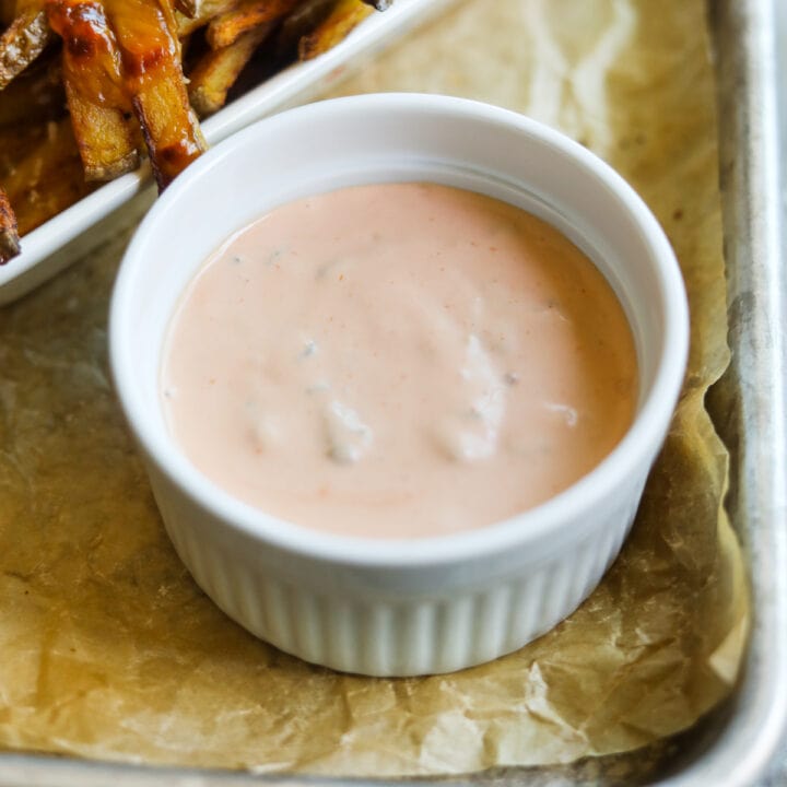 In-N-Out copycat secret spread sauce in a ramekin with animal-style French fries.