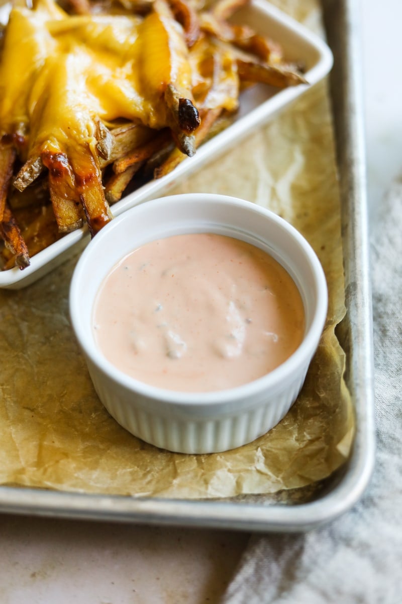 In-N-Out copycat secret spread sauce in a ramekin with animal-style French fries.