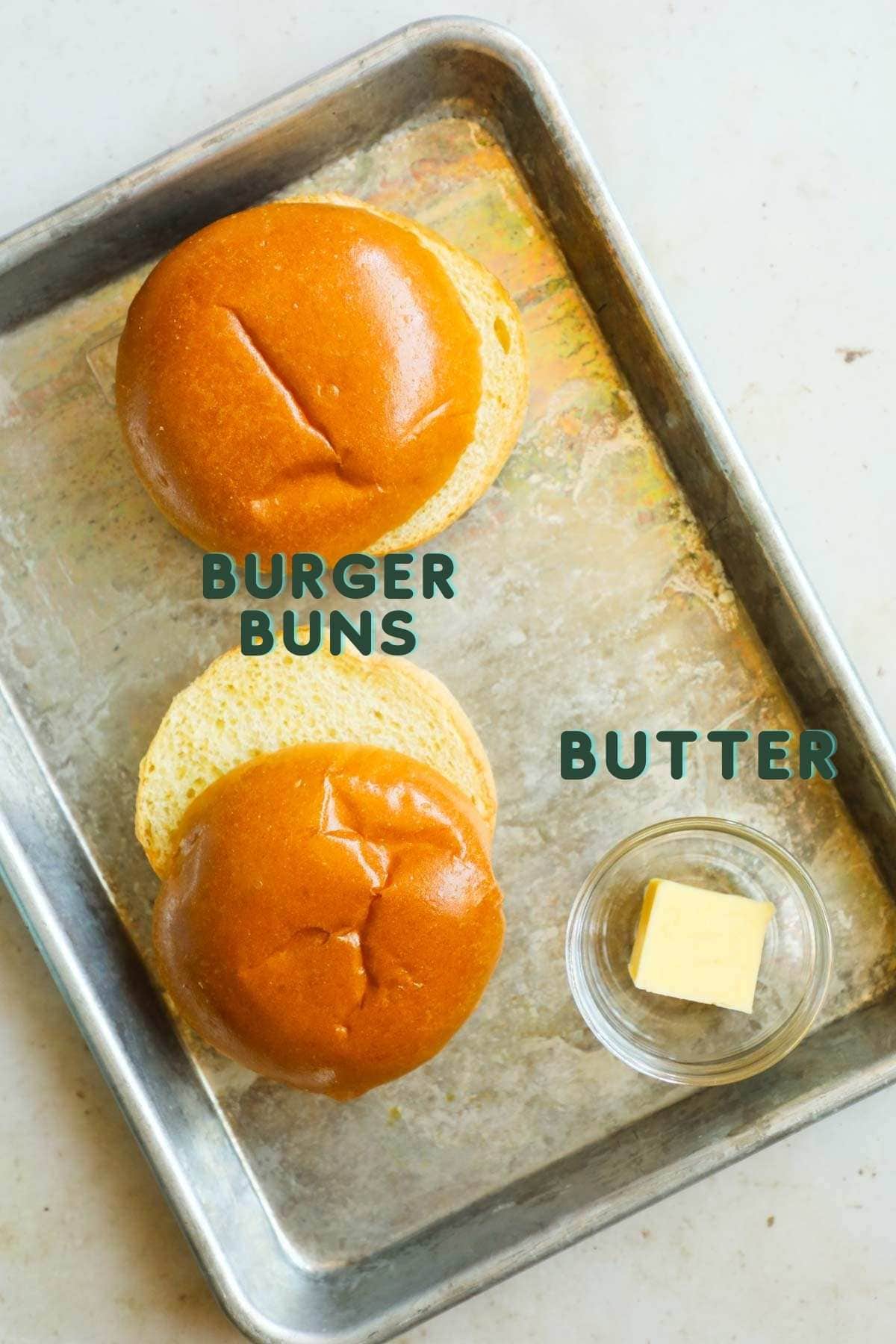 Ingredients to make toasted burger buns, including burger buns and butter.