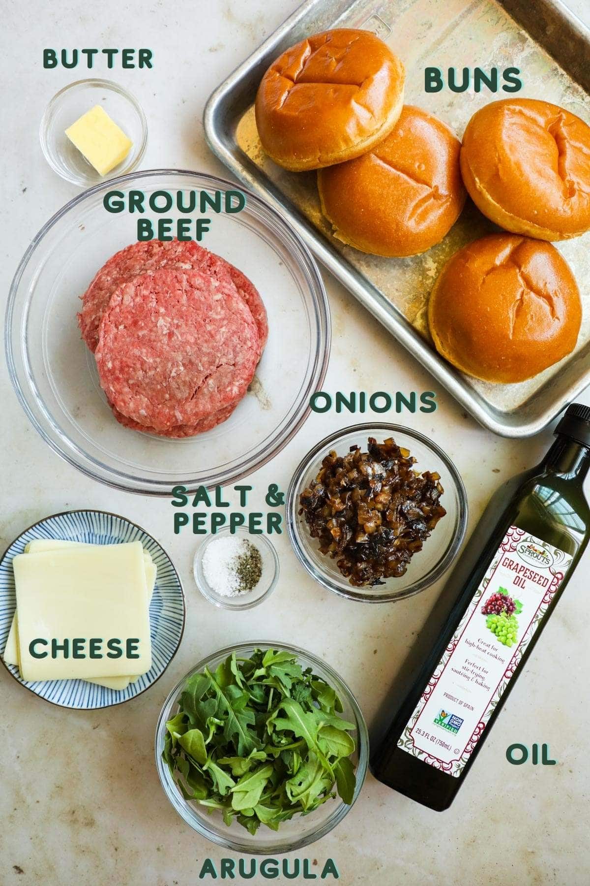 Ingredients to make wagyu beef cheeseburger in a skillet or on the grill.
