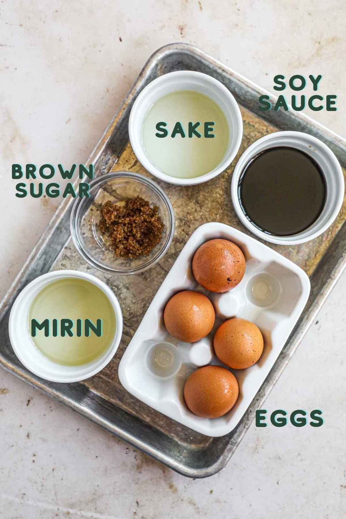 Ingredients to make ajitama ramen eggs, including eggs, brown sugar, mirin, sake, and soy sauce.