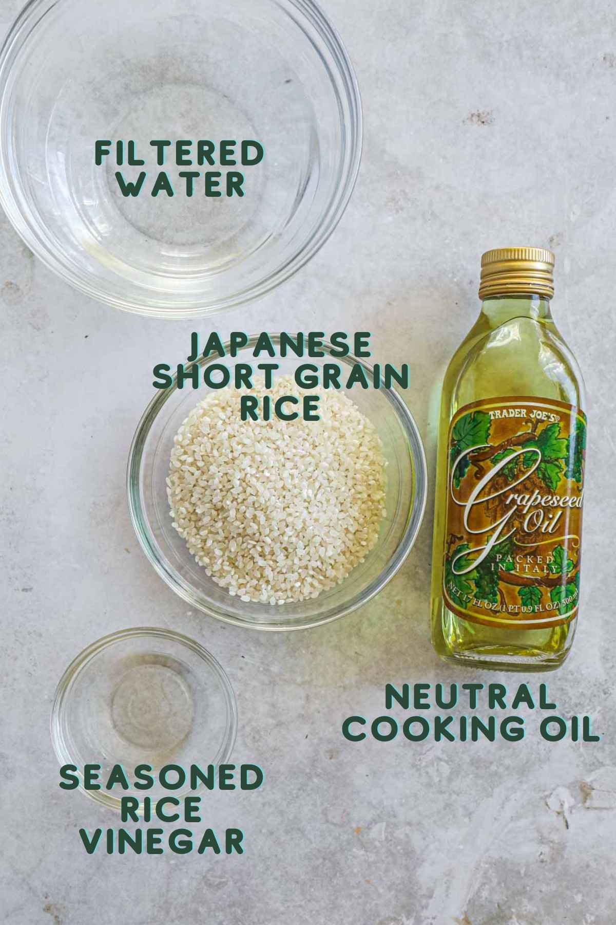Ingredients to make crispy Japanese rice cakes, including Japanese short-grain rice, seasoned rice vinegar, water, and neutral cooking oil.