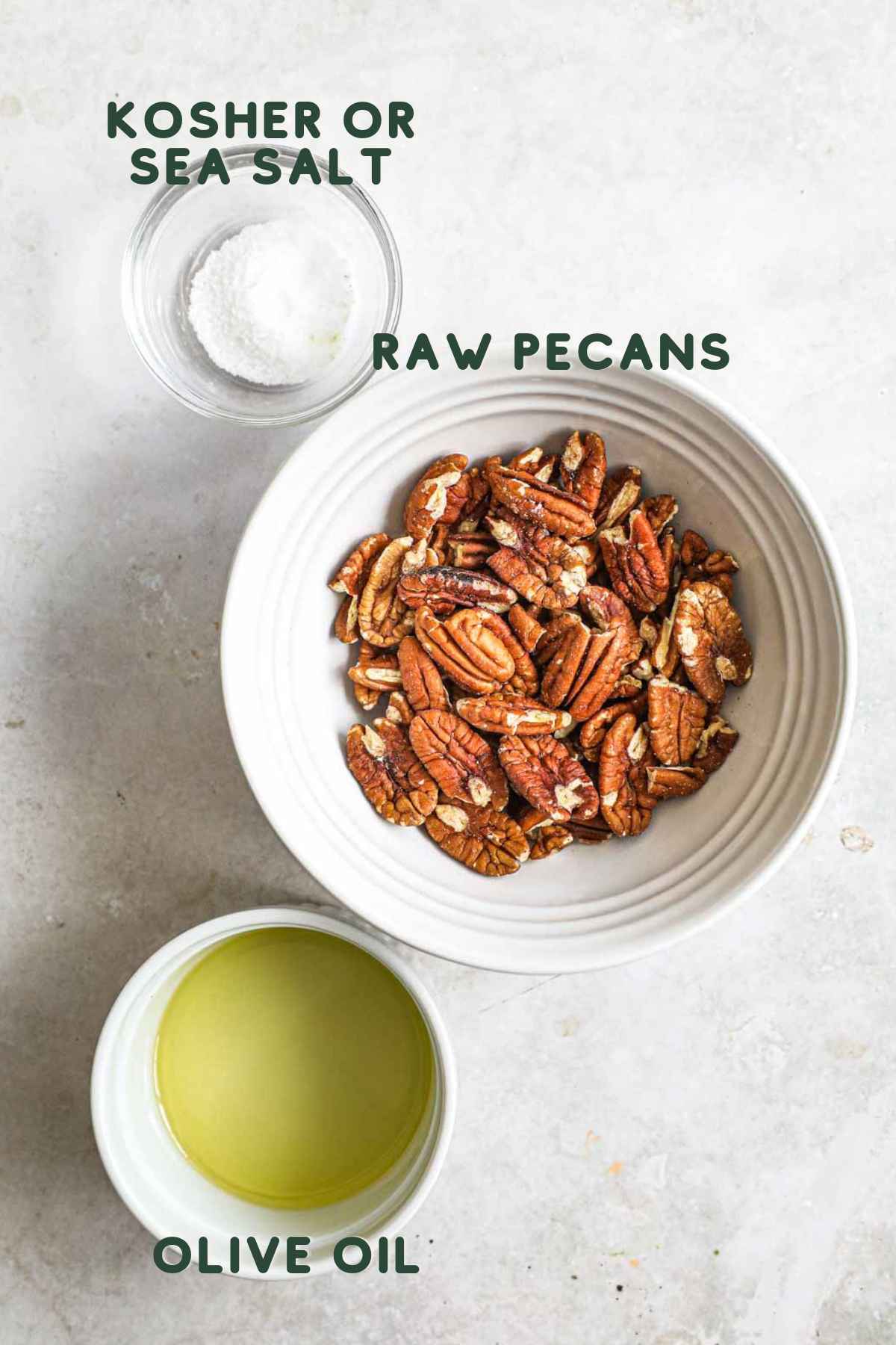 Ingredients to make toasted pecans, including raw pecans, olive oil, and salt.