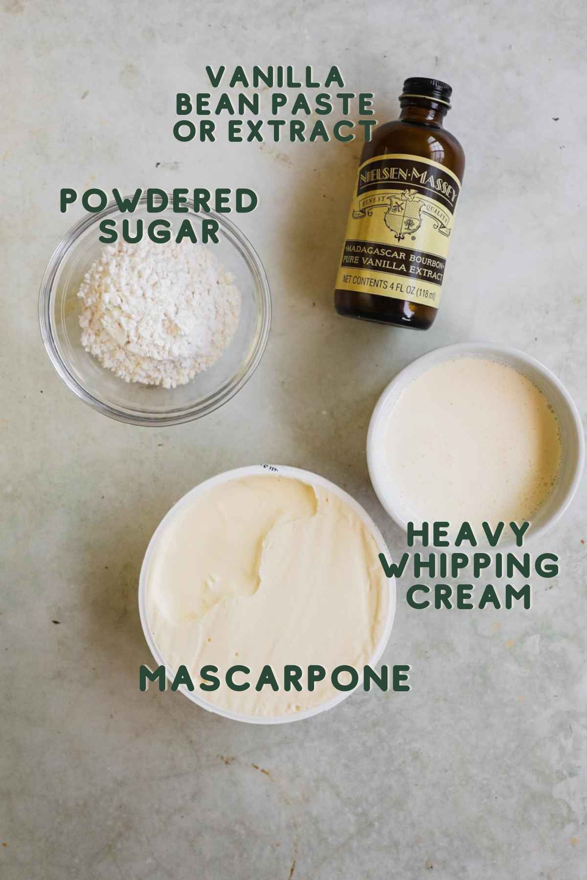 Ingredients for vanilla mascarpone frosting, vanilla bean paste or extract, powdered sugar, heavy whipping cream, mascarpone.