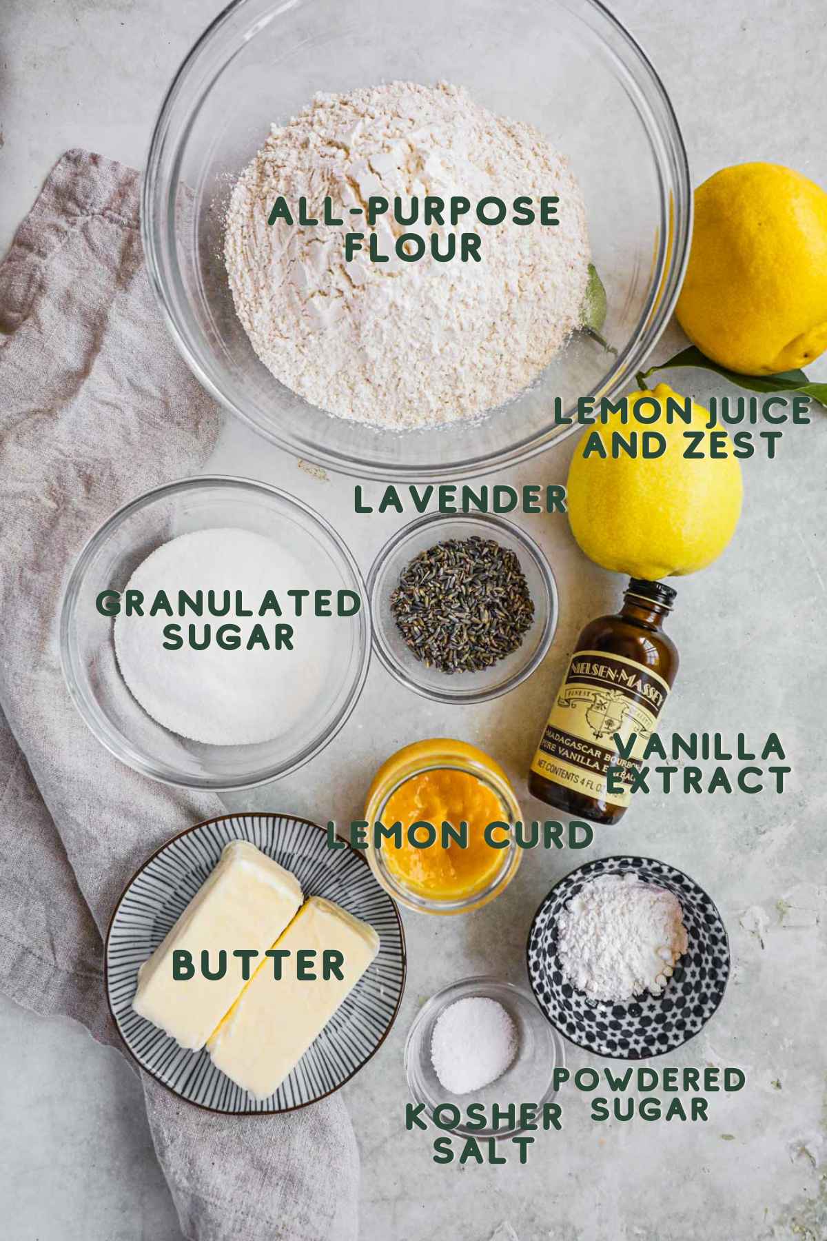 Ingredients for lavender lemon curd cookies, flour, lemon juice and zest, sugar, lavender, vanilla extract, lemon curd, salt, butter, powdered sugar.
