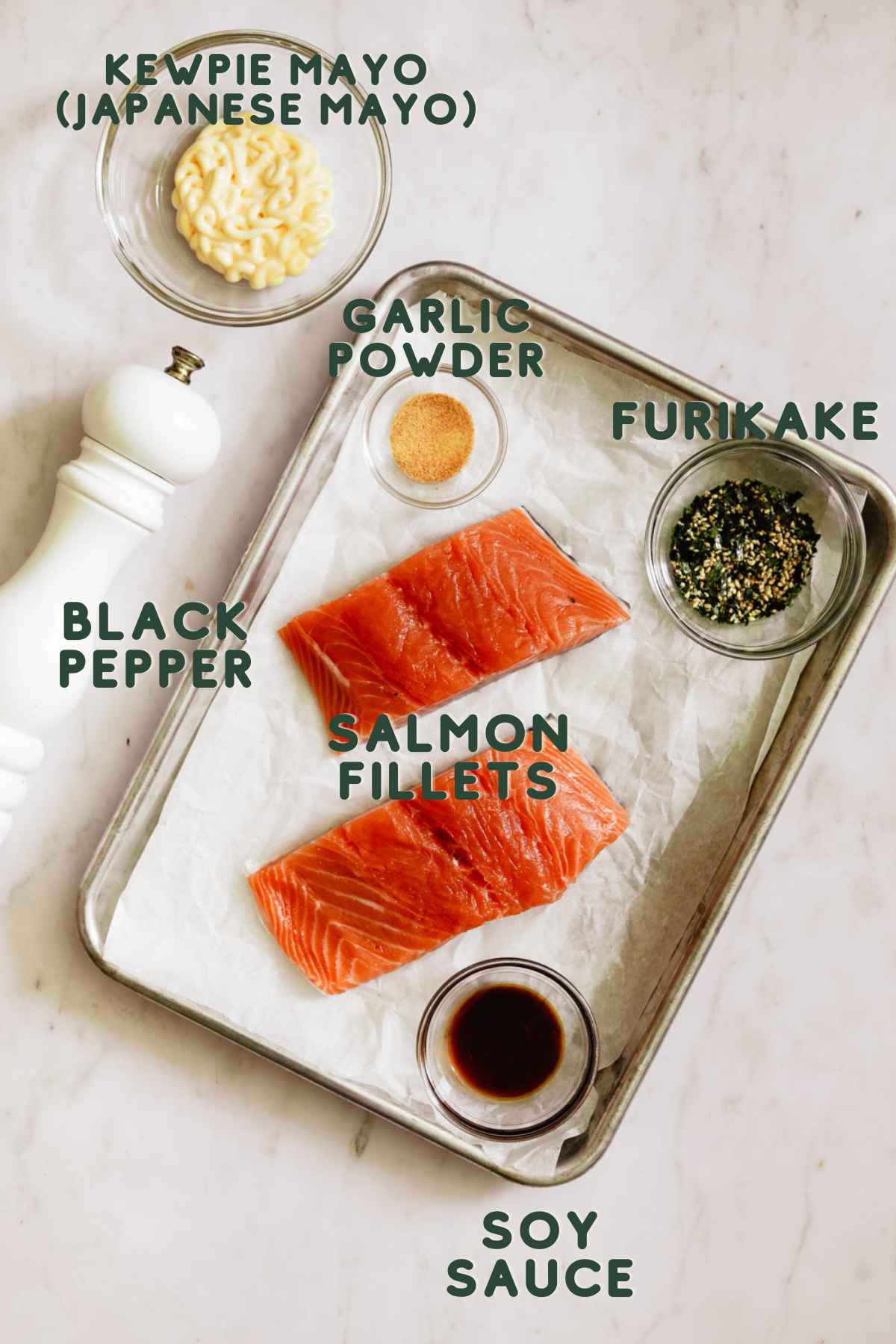 Ingredients to make furikake salmon, salmon fillets, kewpie mayo (japanese mayo), furikake, garlic powder, soy sauce (shoyu), black pepper.