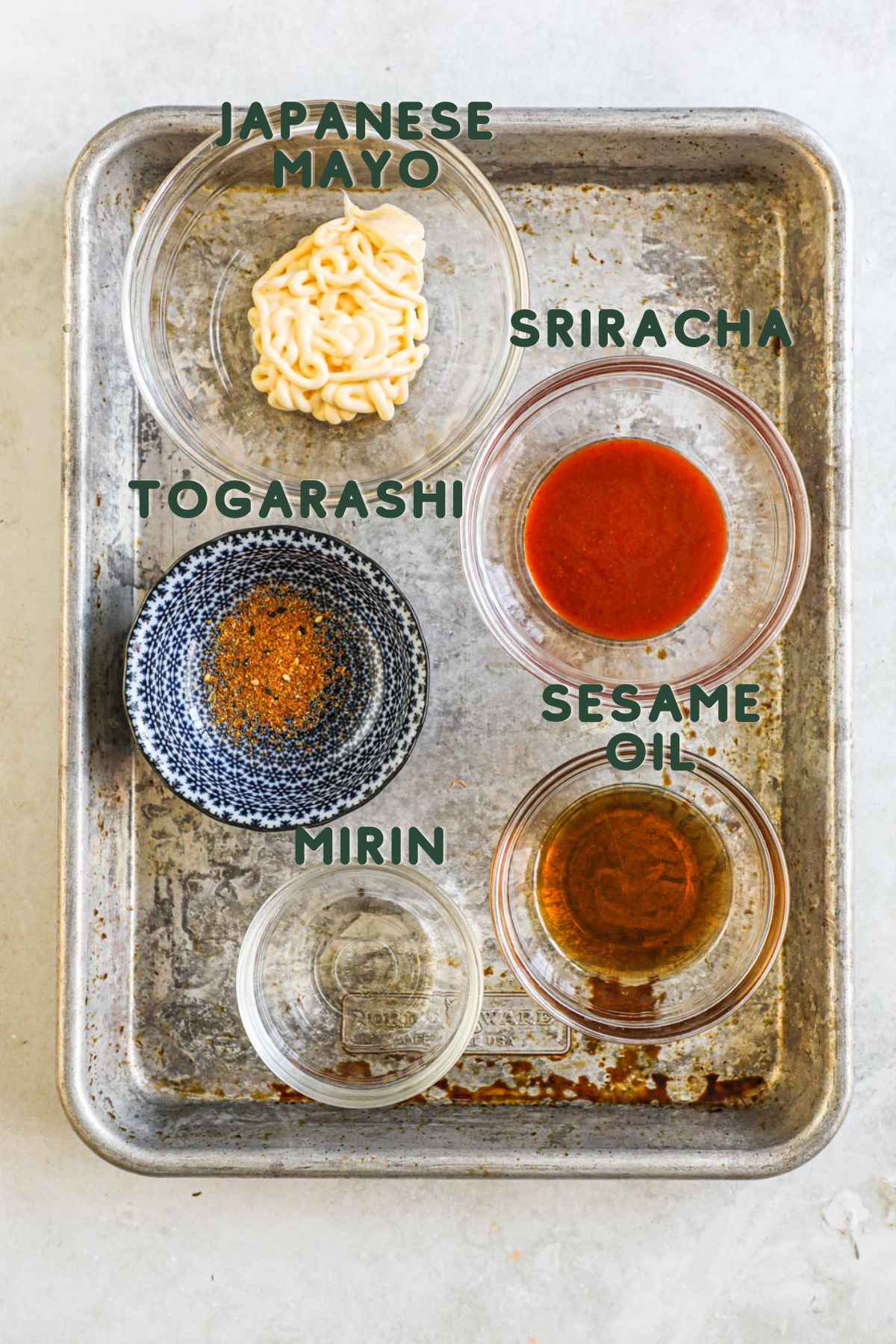 Ingredients to make karaage sliders spicy mayo, japanese mayo, sriracha, togarashi, mirin, sesame oil.