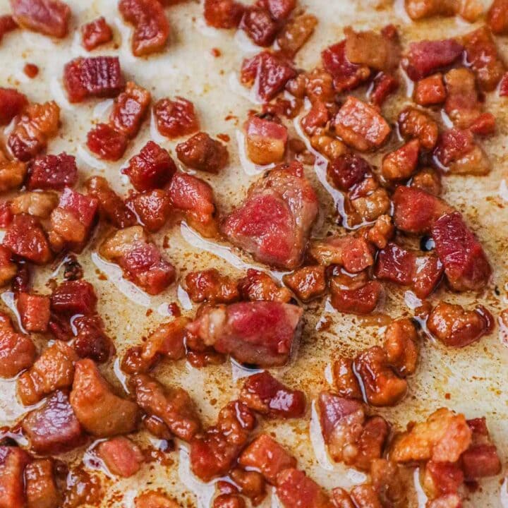 Crispy pancetta in a Le Creuset braiser, used as a topping for pizza, pasta, salads, and more.