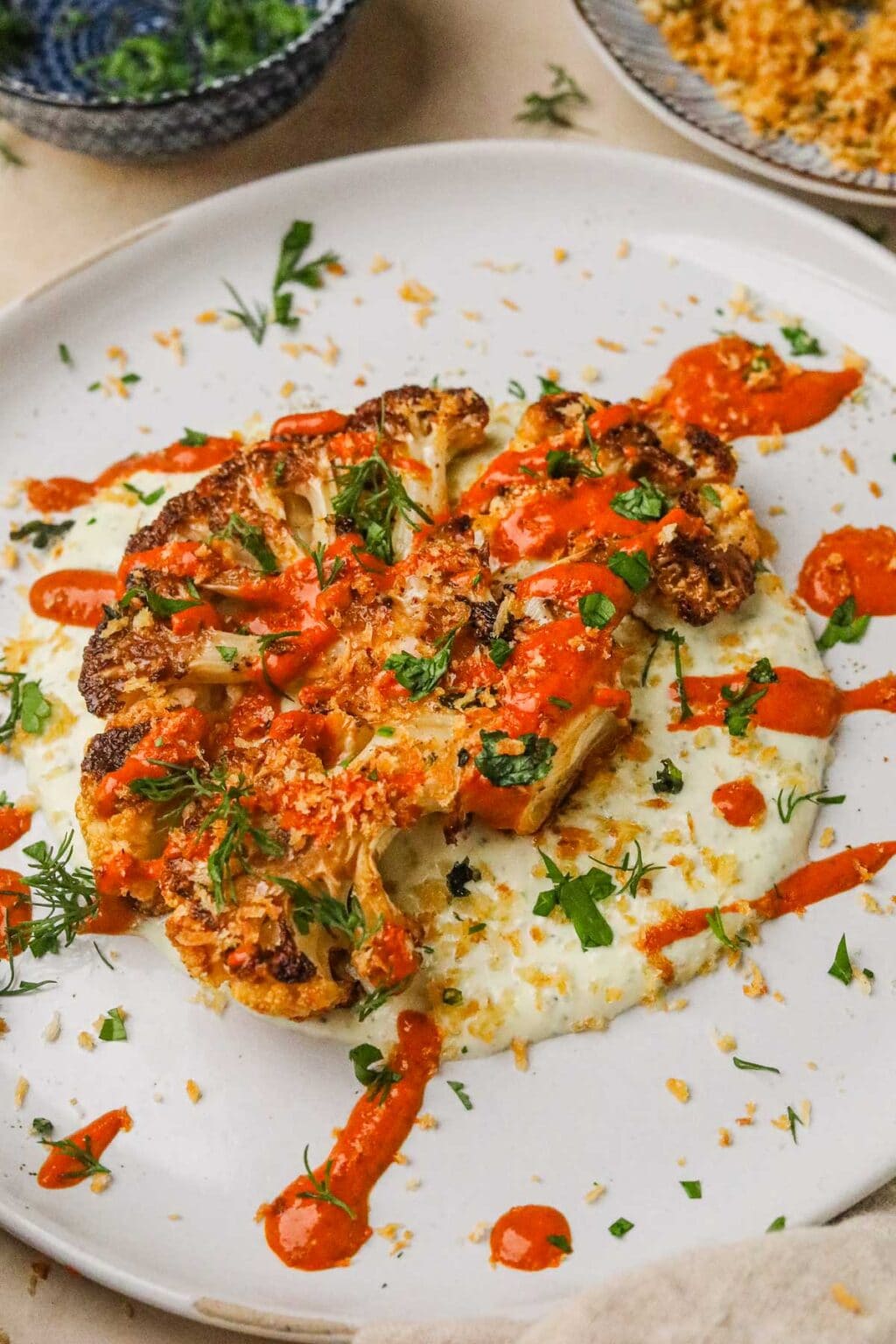 Cauliflower Steaks with Harissa Tahini Sauce • The Heirloom Pantry