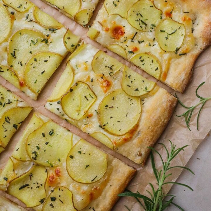 Authentic homemade yukon potato, garlic, and rosemary pizza, also known as pizza con patate.