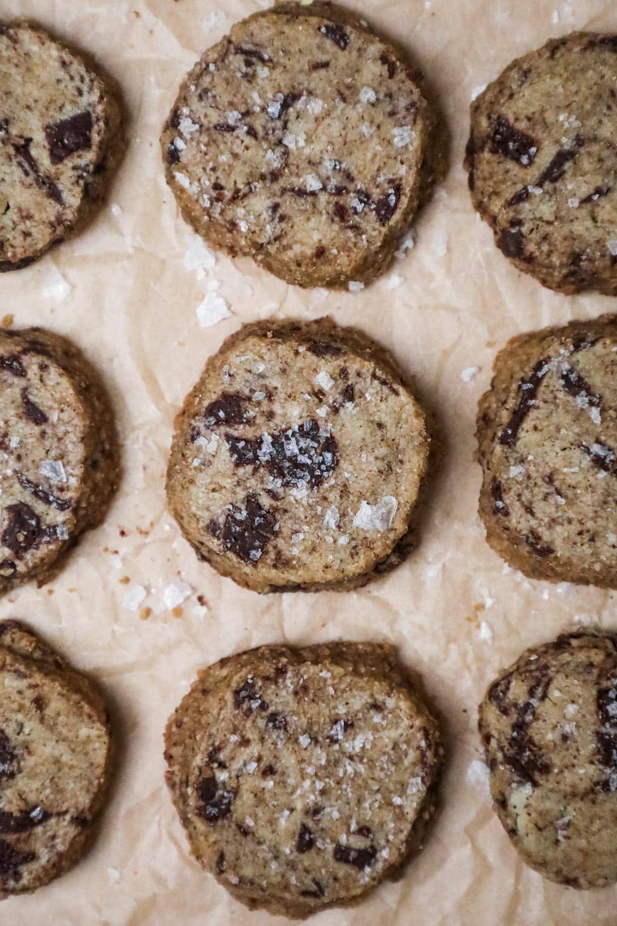 Chocolate chunk brown butter shortbread cookies with flaky sea salt.